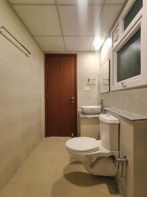 Bathroom in 2 BHK Apartment at Bhartiya Nikoo Homes Phase 2, Thanisandra Main Road – for Rent