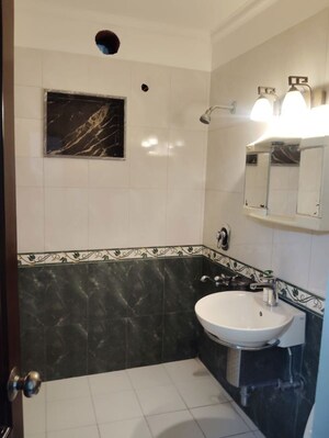 Bathroom in 3 BHK Apartment at Maharishi Dayanand CGHS, Vasant Kunj – for Rent