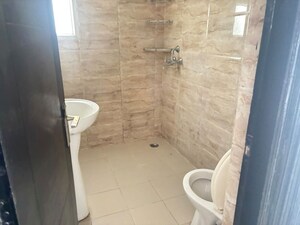 Bathroom in 3 BHK Apartment at Mahagun Moderne, Sector 78 – for Rent