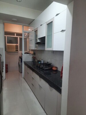 Kitchen in 3 BHK Apartment at Mahagun Moderne, Sector 78 – for Rent