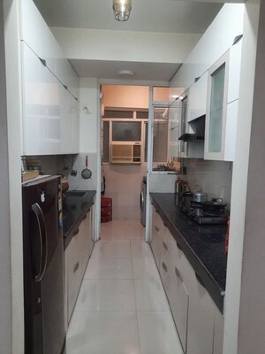 Kitchen in 3 BHK Apartment at Mahagun Moderne, Sector 78 – for Rent