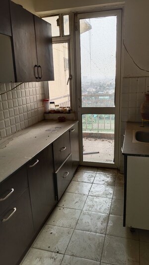 Kitchen in 3 BHK Apartment at Adore Happy Homes Grand, Sector 85 – for Rent