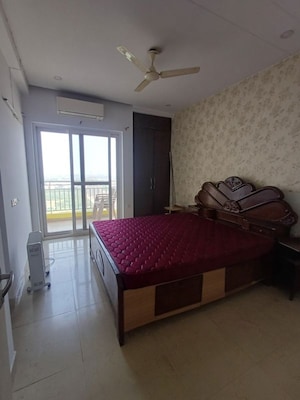 Living Room in 4 BHK Apartment at Mahagun Moderne, Sector 78 – for Rent