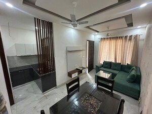 Living Room in 4 BHK Apartment at Gandhi Nagar – for Sale