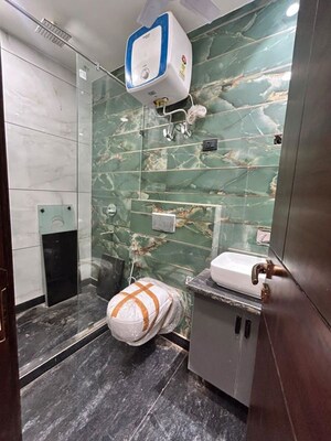 Bathroom in 4 BHK Builder Floor at Sector 21 – for Rent