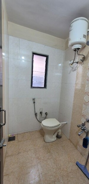 Bathroom in 3 BHK Apartment at Chandkheda – for Rent