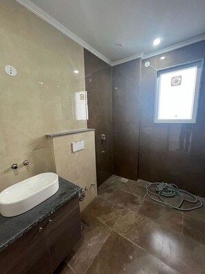 Bathroom in 4 BHK Builder Floor at Palam Vihar Residents Association, Palam Vihar – for Rent