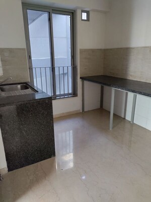 Kitchen in 3 BHK Apartment at Oberoi Realty Esquire, Goregaon East – for Rent