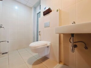 Bathroom in 3 BHK Apartment at Godrej Emerald, Ghodbunder Road – for Rent