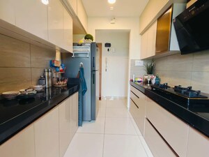 Kitchen in 3 BHK Apartment at Godrej Emerald, Ghodbunder Road – for Rent