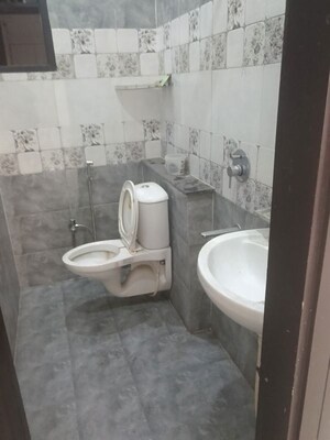 Bathroom in 3 BHK Builder Floor at Dhakoli – for Rent