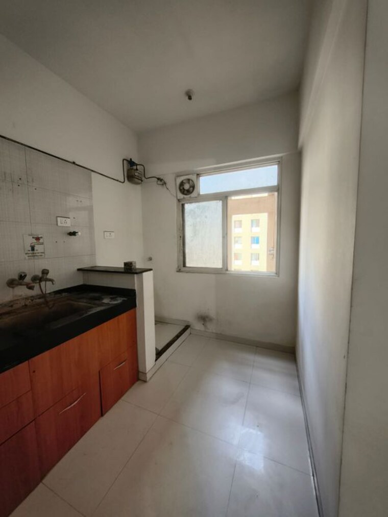 Kitchen, nyati-elan 2 Bedroom 821 Sq.Ft. Apartment In Wagholi Pune 10570090