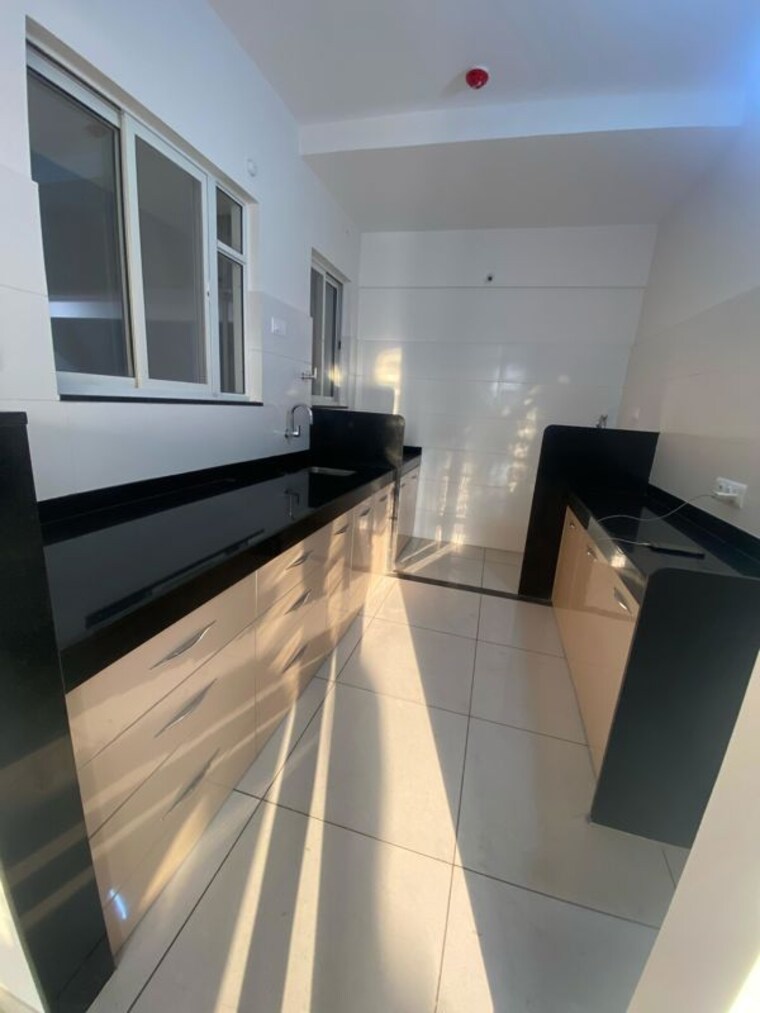 Kitchen, vj-yashone-infinitee 2 Bedroom 1100 Sq.Ft. Apartment In Tathawade Pune 10570150