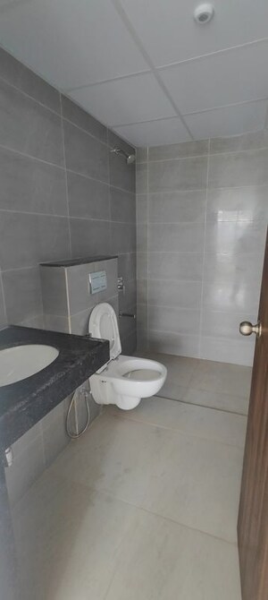 Bathroom in 2 BHK Apartment at Shapoorji Pallonji Sensorium, Hinjewadi – for Rent