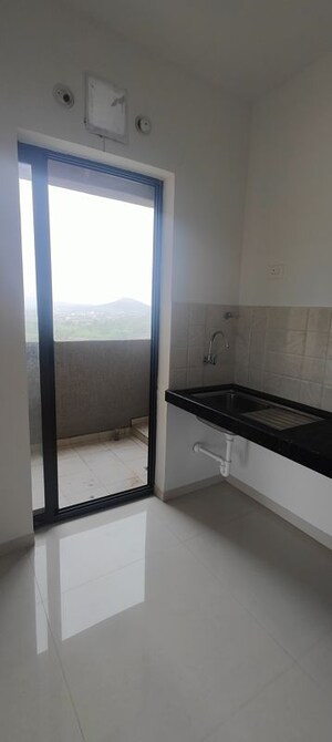 Kitchen in 2 BHK Apartment at Shapoorji Pallonji Sensorium, Hinjewadi – for Rent