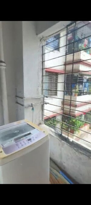 Kitchen in 2 BHK Apartment at Bhakti Apartment, Viman Nagar – for Rent