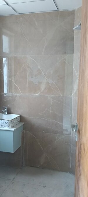 Bathroom in 2.5 BHK Builder Floor at Smart World Gems, Sector 89 – for Rent