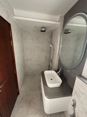 Bathroom in 4 BHK Apartment at Jaypee Imperial Court, Sector 128 – for Rent
