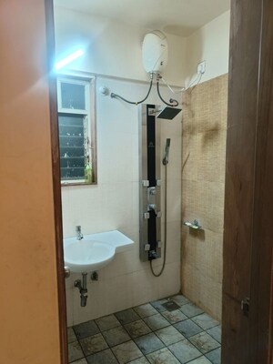 Bathroom in 2 BHK Apartment at Manav Silver Skyscapes, Wakad – for Rent