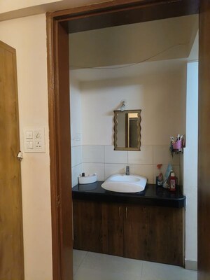 Bathroom in 2 BHK Apartment at Manav Silver Skyscapes, Wakad – for Rent