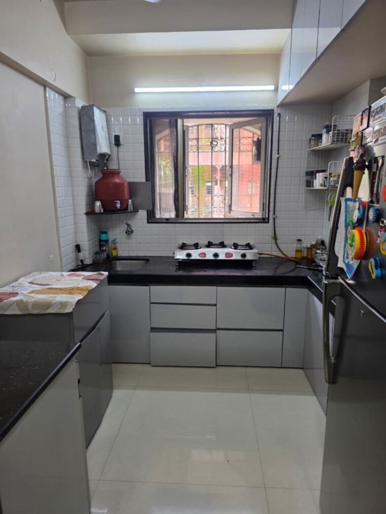 Kitchen, ajmera-bhakti-park 2 Bedroom 692 Sq.Ft. Apartment In Bhakti Park Mumbai 10570420