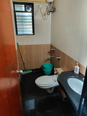 Bathroom in 2 BHK Apartment at Ajmera Bhakti Park, Bhakti Park – for Rent