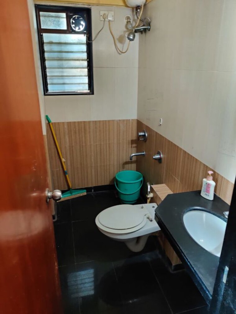 Bathroom, ajmera-bhakti-park 2 Bedroom 692 Sq.Ft. Apartment In Bhakti Park Mumbai 10570420