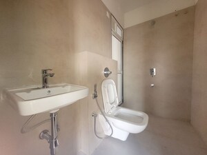 Bathroom in 1 BHK Apartment at Puranik City, Kasarvadavali – for Rent
