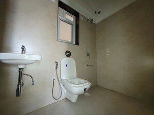 Bathroom in 2 BHK Apartment at Puranik City Reserva, Ghodbunder Road – for Rent