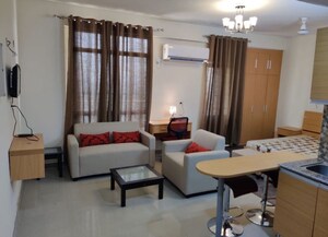 Team Area in 1 RK Apartment at Supertech Czar Suites, Omicron I Greater Noida – for Rent