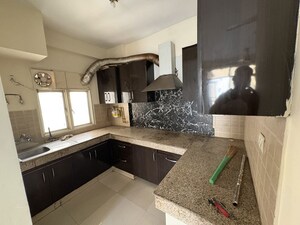 Kitchen in 2.5 BHK Apartment at Supertech Czar Suites, Omicron I Greater Noida – for Rent
