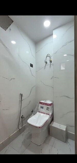 Bathroom in 4 BHK Builder Floor at Mohan Garden – for Sale