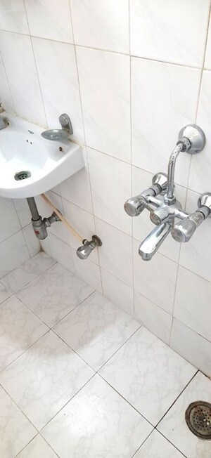 Bathroom in 1 BHK Apartment at Gaurav Shikhar Chs, Kandivali East – for Rent