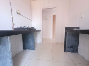 Kitchen in 1.5 BHK Apartment at Godrej Emerald, Ghodbunder Road – for Rent
