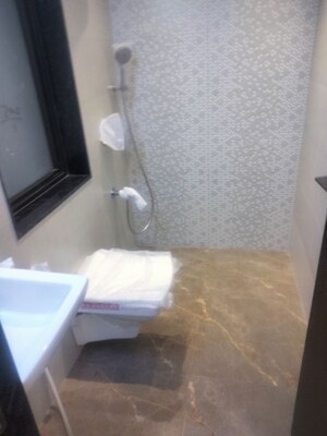 Bathroom in 1 BHK Apartment at Omkar Signet, Malad East – for Sale