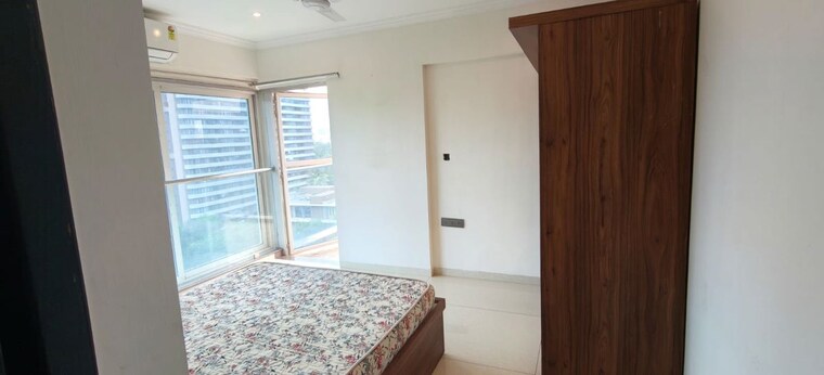 Bedroom, magarpatta-city-roystonea 2 Bedroom 1200 Sq.Ft. Apartment In Hadapsar Pune 10570655