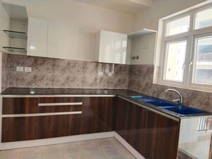 Kitchen in 3.5 BHK Apartment at Orris Aster Court Premier, Sector 85 – for Sale