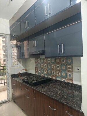Kitchen in 3 BHK Apartment at Geotech Pristine Avenue, Sector 16c Greater Noida – for Rent