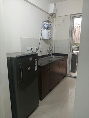 Kitchen in 3 BHK Apartment at Geotech Pristine Avenue, Sector 16c Greater Noida – for Rent