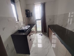 Kitchen in 2 BHK Apartment at Raymond Ten X Habitat, Pokhran Road No Two – for Rent