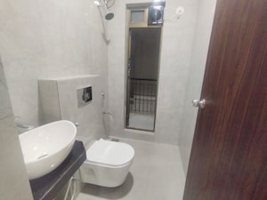 Bathroom in 2 BHK Apartment at Raymond Ten X Habitat, Pokhran Road No Two – for Rent