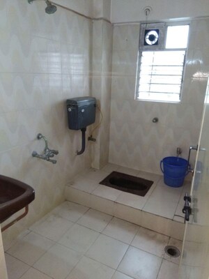 Bathroom in 2 BHK Apartment at Shantiban CHS, Kothrud – for Rent