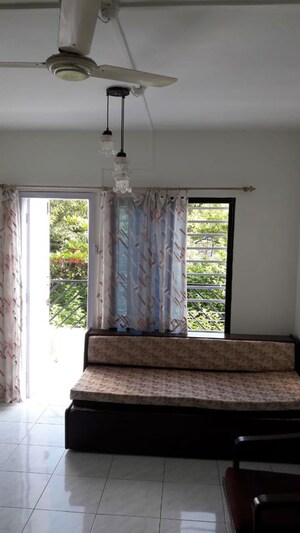 Living Room in 2 BHK Apartment at Damodar Villa, Kothrud – for Rent