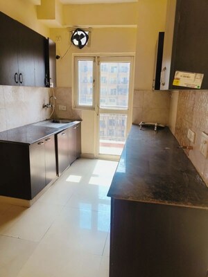 Kitchen in 3 BHK Apartment at Aims Golf City, Sector 75 – for Rent