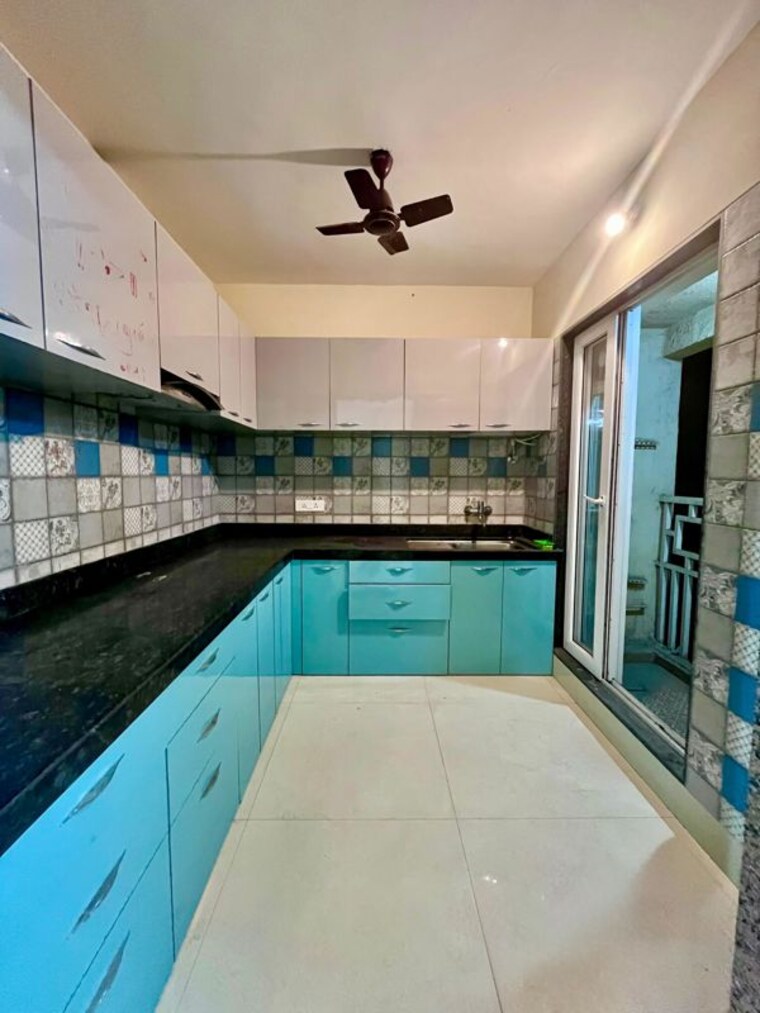 Kitchen, paradise-lifespaces-sai-world-city 2 Bedroom 1000 Sq.Ft. Apartment In New Panvel Navi Mumbai 10570804