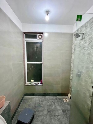Bathroom in 2 BHK Apartment at Paradise Lifespaces Sai World City, New Panvel – for Rent