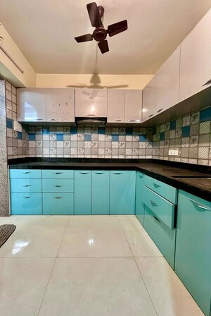 Kitchen in 2 BHK Apartment at Paradise Lifespaces Sai World City, New Panvel – for Rent