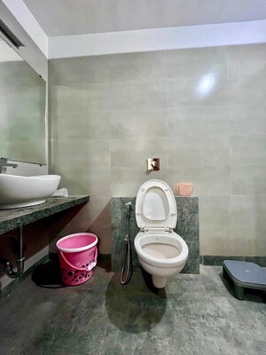 Bathroom in 2 BHK Apartment at Paradise Lifespaces Sai World City, New Panvel – for Rent