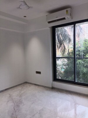 Bathroom in 2 BHK Apartment at Sarthak Amrut Tara, Andheri West – for Rent