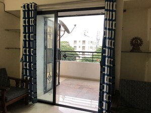 Terrace in 3 BHK Apartment at Dhangauri Apartment, Dahanukar Colony – for Rent
